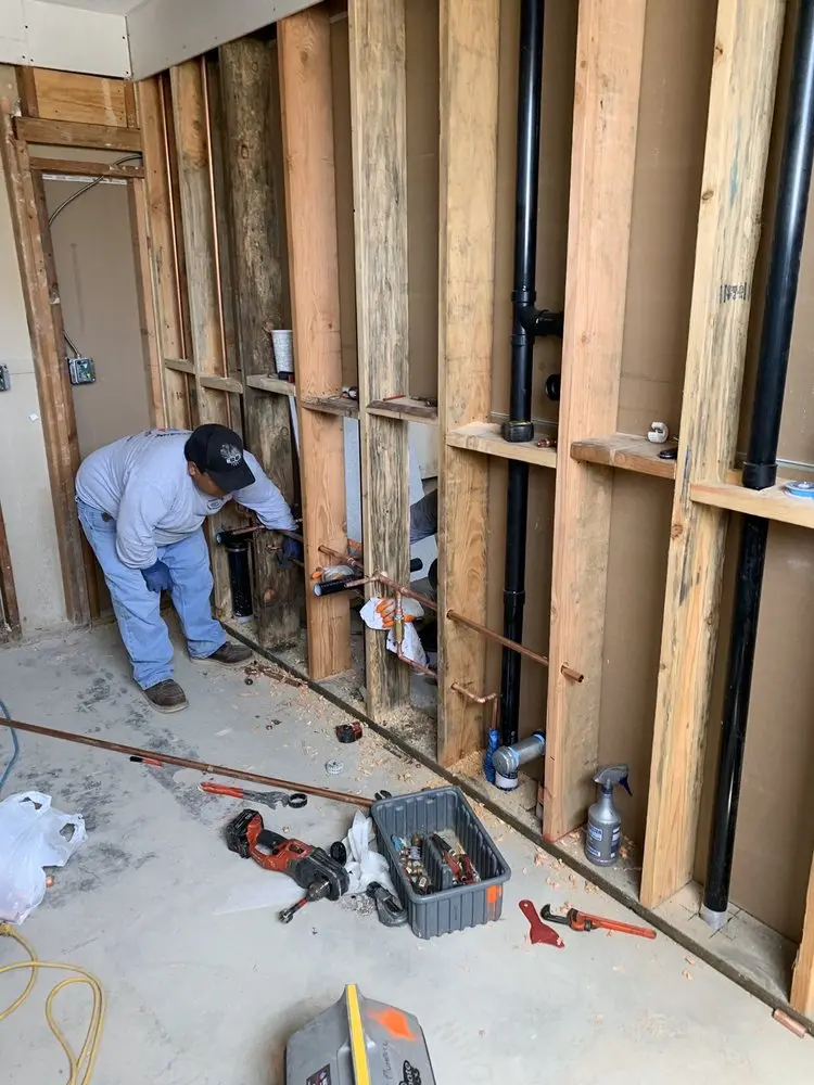 Commercial rough-in plumbing for Water Heater Replacement in Lawrence